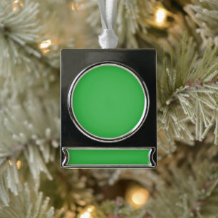 a green background with a white border silver plated banner ornament