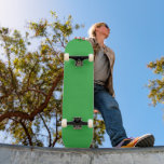a green background with a white border skateboard<br><div class="desc">The image is a bright blue square with a uniform colour and a smooth texture. It stands out against the background with a striking visual contrast.</div>