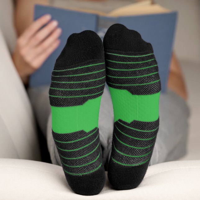 a green background with a white border socks (Bottom)