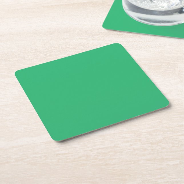 a green background with a white border square paper coaster (Angled)