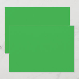 a green background with a white border thank you card
