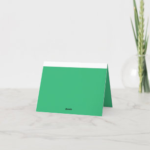 a green background with a white border thank you card