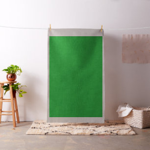  a green backgrounds with a white border fabric