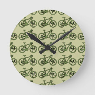 a green bicycle round clock