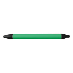 A green screen positioned against a white backgrou black ink pen