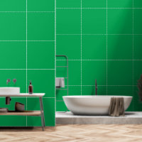 A green screen positioned against a white backgrou