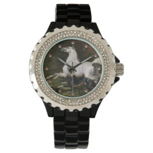 A Grey Arab Stallion Galloping With Dogs Watch