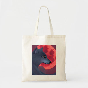 A Grey Wolf Staring at a Blood Moon Tote Bag