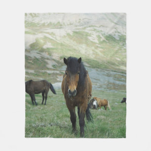 A GROUP OF HORSES ON A MOUNTAIN PASTURE FLEECE BLANKET