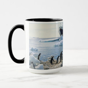 A Group Of Penguins Standing On An Icy Beach Mug