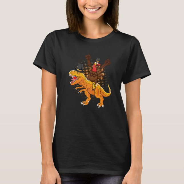 A happy turkey riding a dinosaur they wear hat tha T-Shirt (Front)