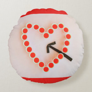 a heart of glasses and snow on Round Throw Pillow