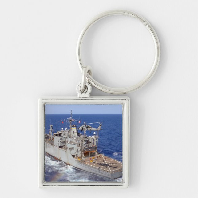 A helicopter clears the flight deck key ring (Front)