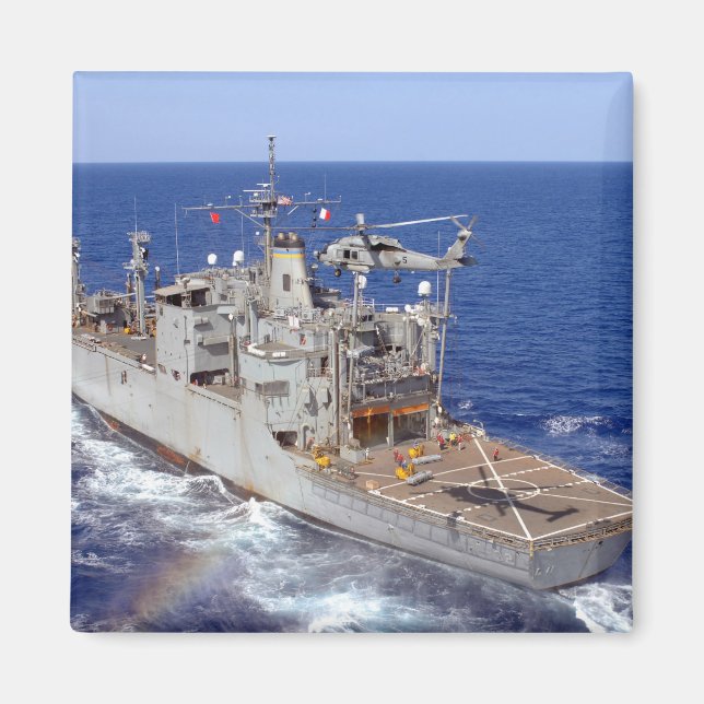 A helicopter clears the flight deck magnet (Front)