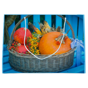 A holiday basket full of pumpkins large gift bag