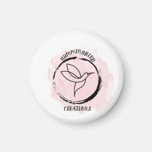 A hummingbird design for a logo on a keychain magnet