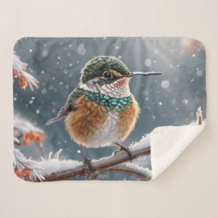 A hummingbird in the first snow of winter sherpa blanket
