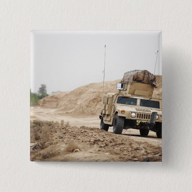 A Humvee conducts security 15 Cm Square Badge (Front)