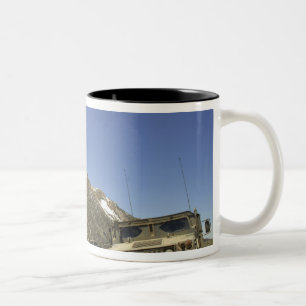 A Humvee is parked at the re-transmitting site Two-Tone Coffee Mug