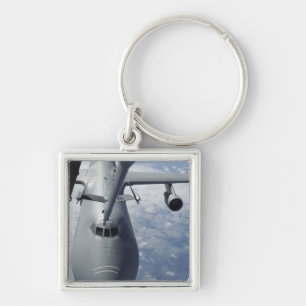 A KC-10 Extender prepares to refuel a C-5 Galax Key Ring