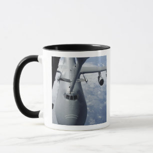A KC-10 Extender prepares to refuel a C-5 Galax Mug