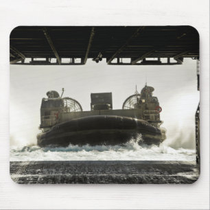 A landing craft air cushion prepares to enter mouse mat