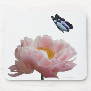 a large pink peony is visited by a ethereal mouse mat