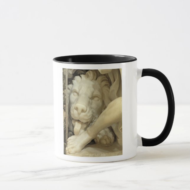 A Lion licking the foot of Daniel Mug (Right)