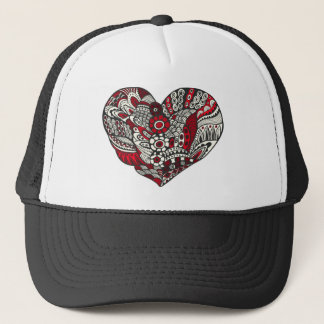 A little bit of red trucker hat