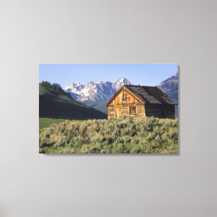 A log cabin and the Sawtooth Mountains in Canvas Print