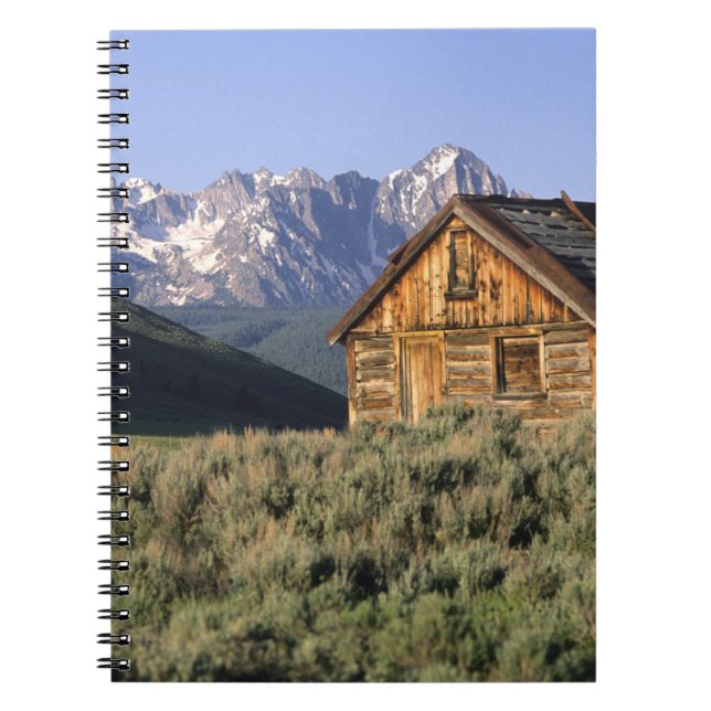 A log cabin and the Sawtooth Mountains in Notebook (Front)