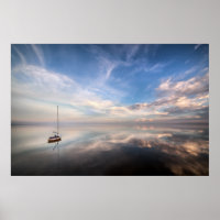 A Lone Sailboat On The Calm Waters Of Salton