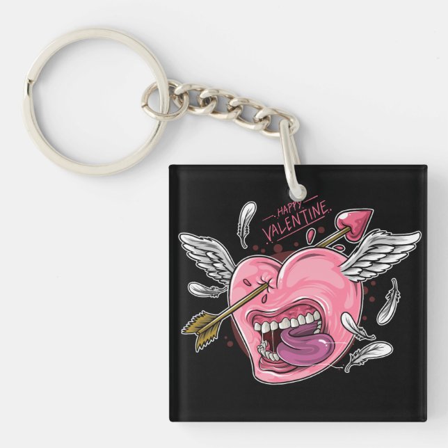a love heart with lips and wings that are hit by l key ring (Front)