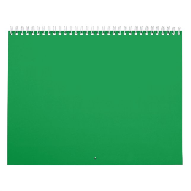 A lush green backdrop with a clean white square po calendar (Cover)