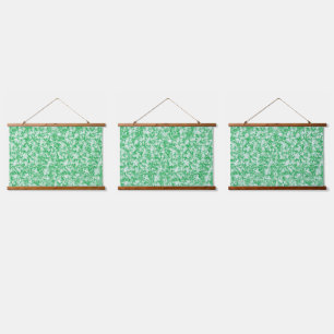 A lush, green fern with delicate, arching fronds f hanging tapestry