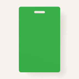 A lush landscape filled with dense green trees and ID badge