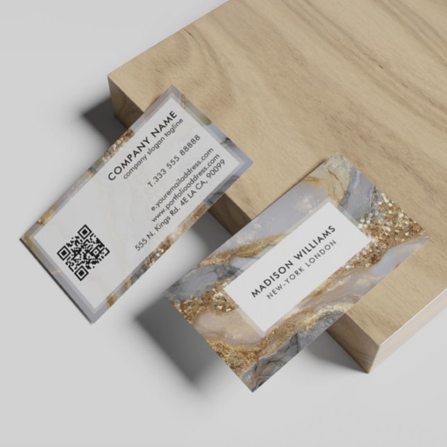 A luxurious gold and white marble background business card (Creator Uploaded)