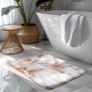 A luxurious rose-gold marble background bath mat