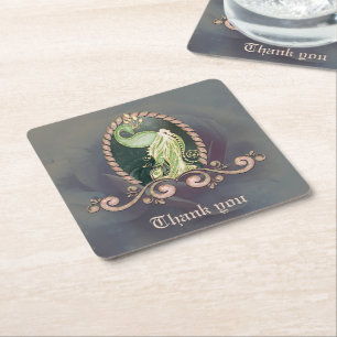 A majestic peacock in gold and green. square paper coaster
