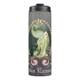 A majestic peacock in gold and green thermal tumbler