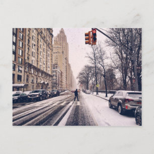 A Man Crossing A Snowy Central Park West Postcard