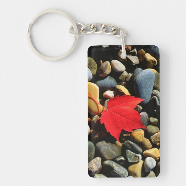 A Maple leaf on a Rock Background Key Ring (Front)