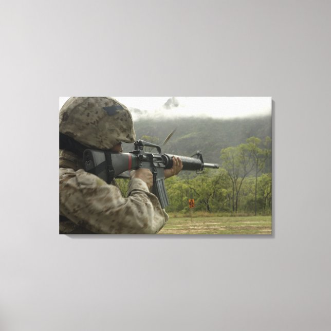 A Marine conducts drills Canvas Print (Front)
