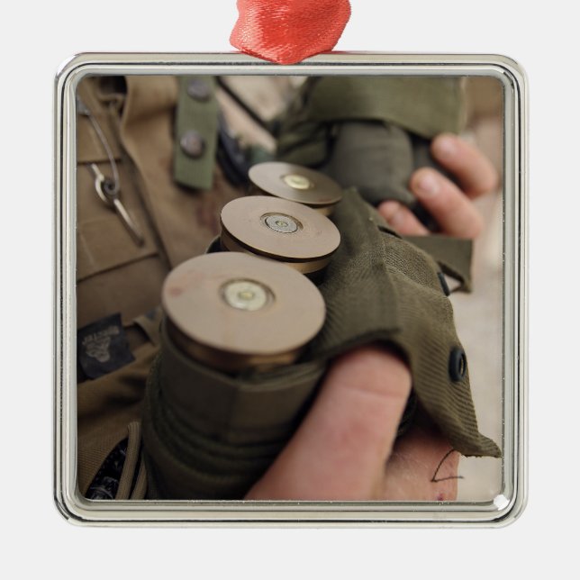 A Marine cradles handfuls of 40 mm grenades Metal Tree Decoration (Front)