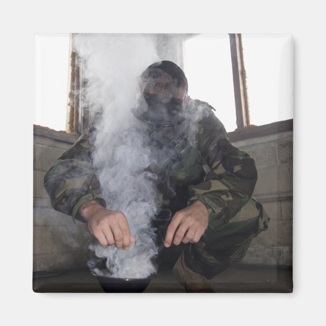 A marine fills the gas chamber with more CS gas Magnet (Front)