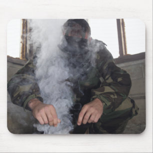 A marine fills the gas chamber with more CS gas Mouse Mat