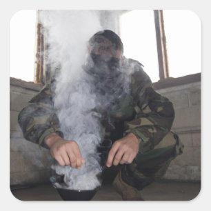A marine fills the gas chamber with more CS gas Square Sticker