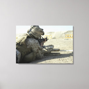 A Marine fires a M16A2 service rifle Canvas Print