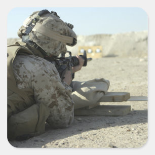 A Marine fires a M16A2 service rifle Square Sticker