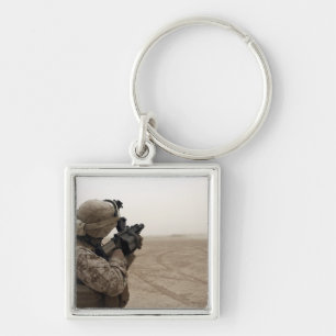 A Marine fires the M-32 Key Ring